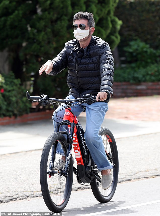 The funny side of things: Simon Cowell's half-brother Tony attempted to bring some light relief by sharing a playful tweet on Saturday after the mogul's his bike injury (pictured in April)
